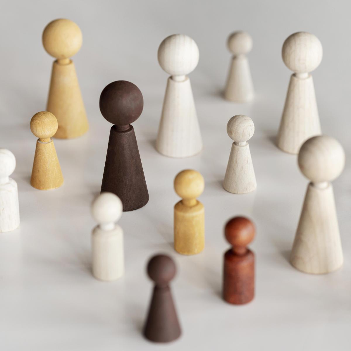diverse-wooden-characters-inclusion-concept
